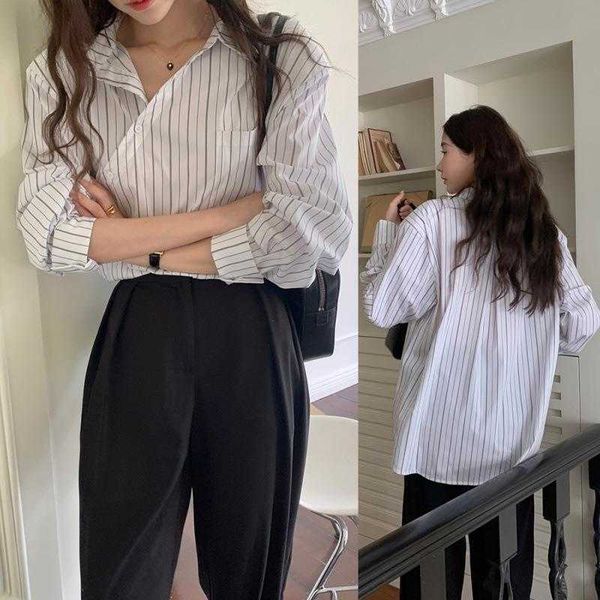 

irregular diagonal button striped shirt autumn temperament commute lapel, White