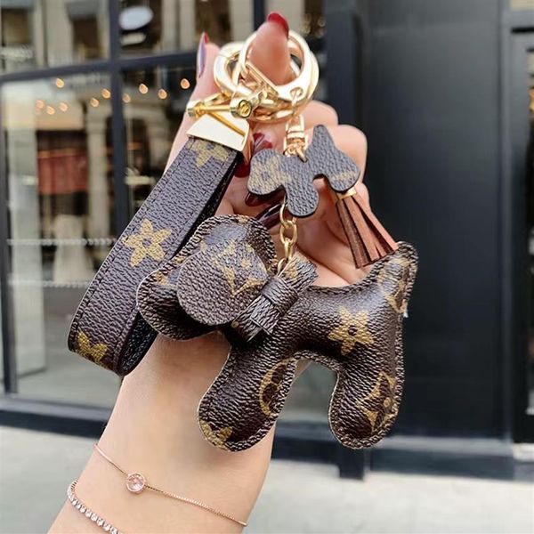 

fashion luxurys bags key chain buckle lovers car keychain handmade leather designers keychains men women bag pendant accessories275i, Red;blue