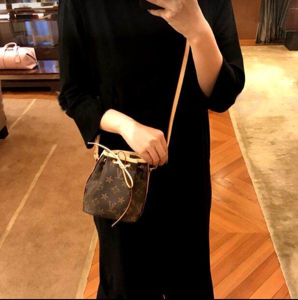 

2023 limited edition designer bag tote bag classic old flower mini drawstring bucket bag clutch handbag crossbody package vintage cowhide ev