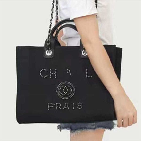 

60% off luxury women's classic canvas beach bag female large backpacks capacity small chain big handbags 50h6