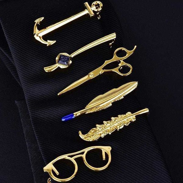 

copper glasses silver tie boat anchor golden feather oil dripping scissors