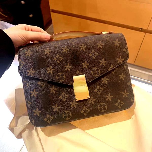 

the new old flower bag is a stylish buckle pouch and a cross-body bag for women