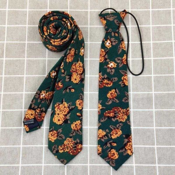 

knotted short small necktie hand suit retro dark green background yellow flower, Black;blue