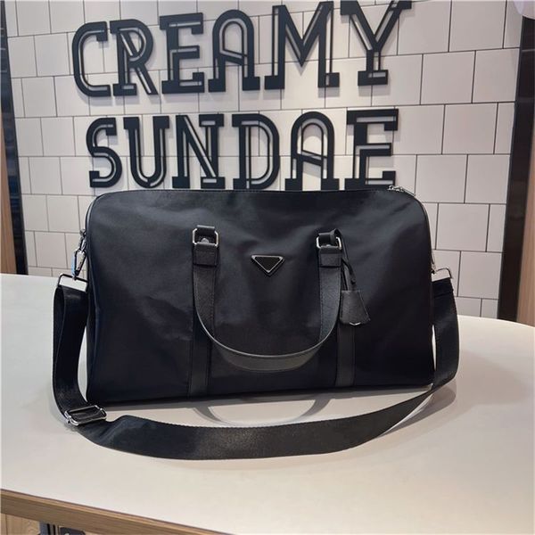 

re nylon duffle bag saffiano handles travel bag triangle enamelled luggages metal textile small lock catch leather zippy casual letter desig
