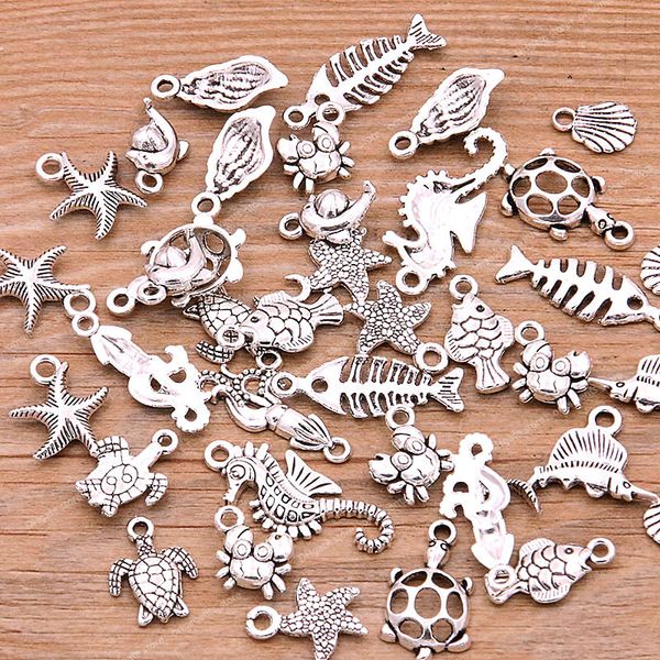 

20pcs vintage metal mix size/style random marine organism fish charms animal pendant for jewelry making diy handmade jewelry fashion jewelry, Silver