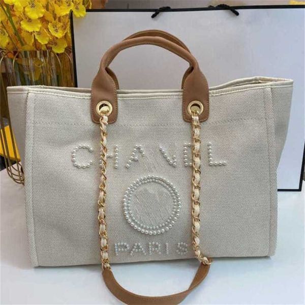 

50% off luxury women's classic canvas beach bag large capacity small chain packs big shopping handbags tm60