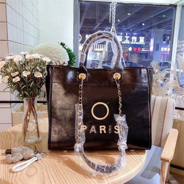 

60% off women's luxury handbags beach metal badge tote bag small female capacity large leather one shoulder backpack n9dr