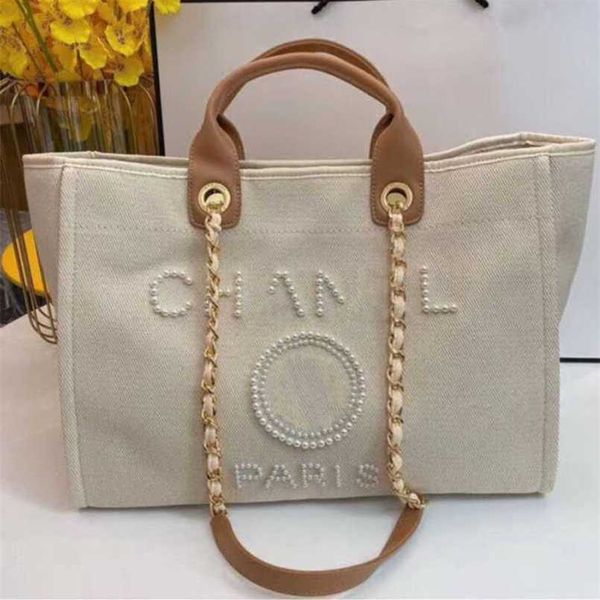 

luxury fashion women's classic canvas beach bag designers female large backpacks capacity small chain packs big shopping handbags i9go