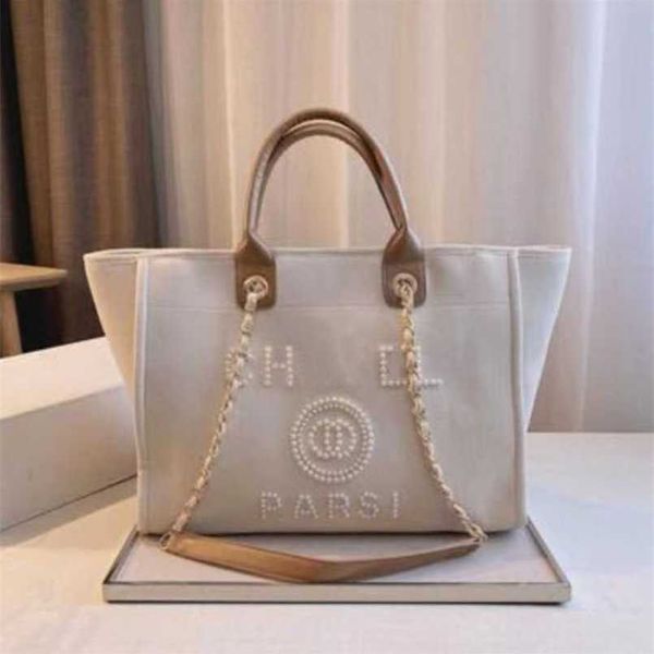 

luxury fashion women's classic canvas beach bag designers female large backpacks capacity small chain packs big shopping handbags 8601