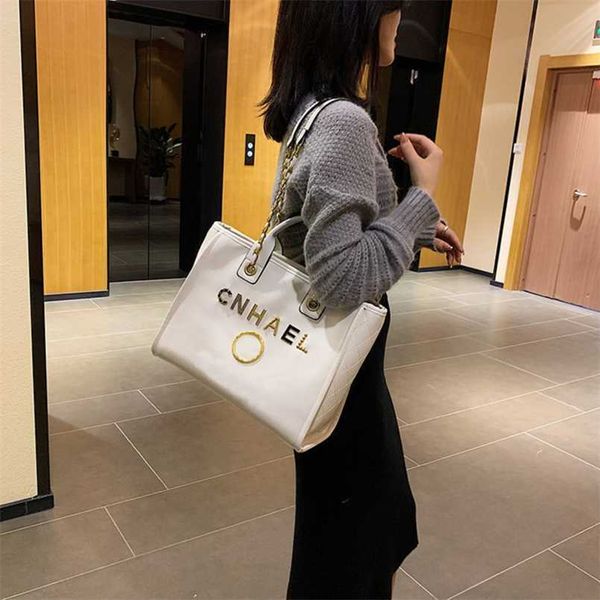 

fashion luxury designer handbags women's beach metal badge tote bag small female capacity large leather one shoulder backpack gaft us o