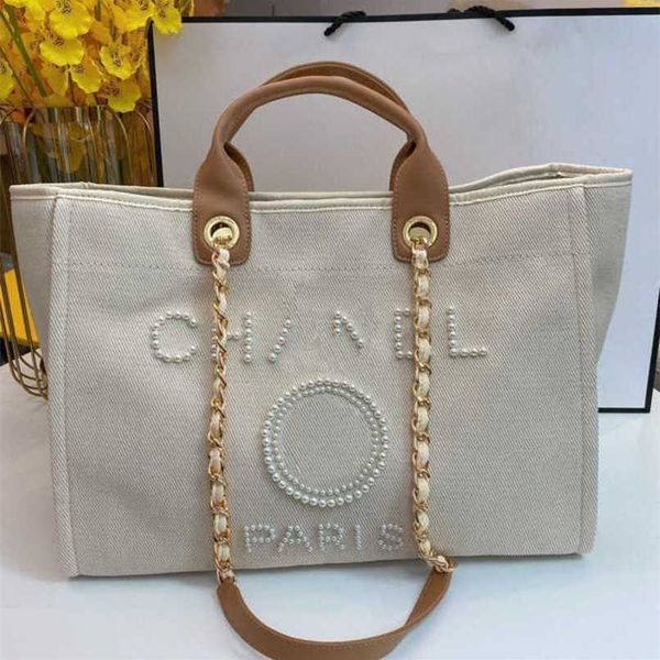 

luxury women's fashion beach classic canvas designers female backpacks large capacity bag small chain packs big shopping handbags spgz