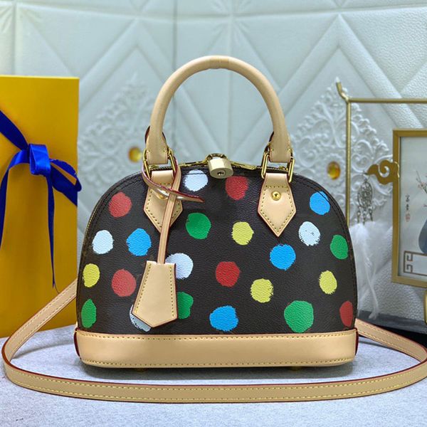 

23ss fashion polka dot totes bag designer genuine leather handle polka dot crossbody bags old flower shell shoulder bag minority handbag