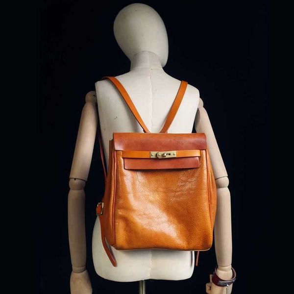 

italian vegetable tanned cowhide handmade high-end backpack ins bag lock buckle leather backpack