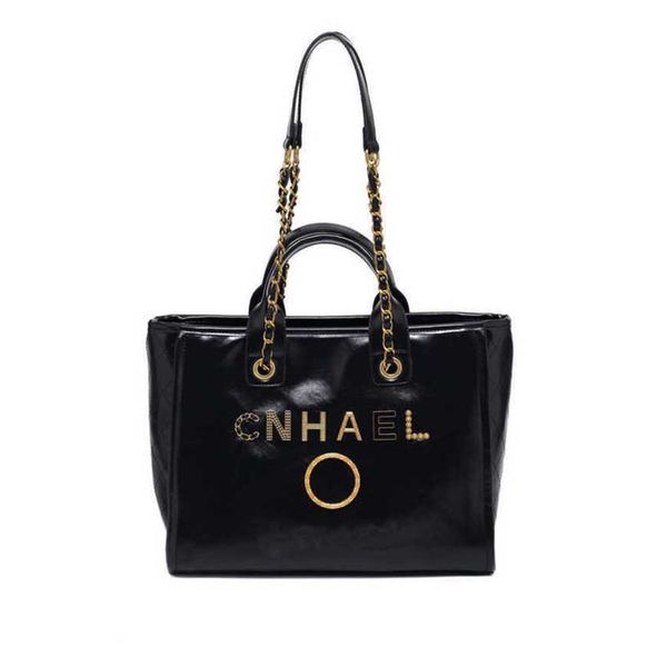 

80% off luxury classic women's handbags beach metal badge tote bag designer small female capacity large leather one shoulder backpack u