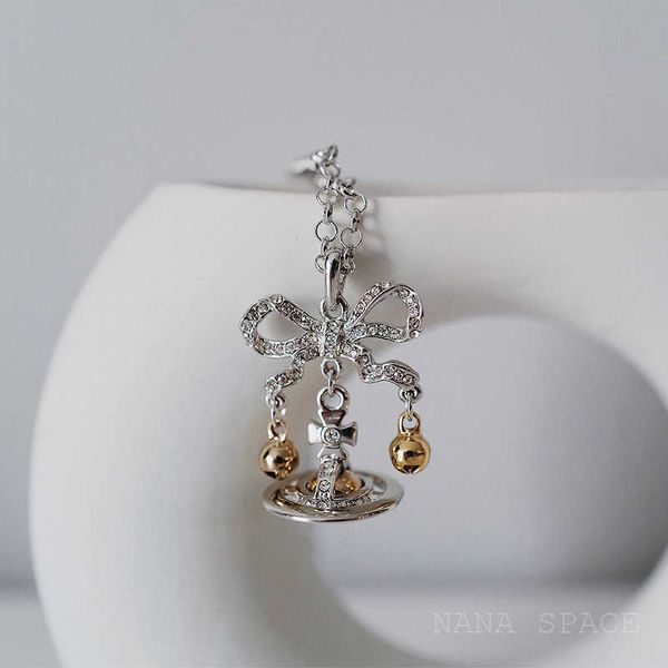 

nanaspace - empress dowager vivi gold and silver christmas bow style bell necklace sweater chain
