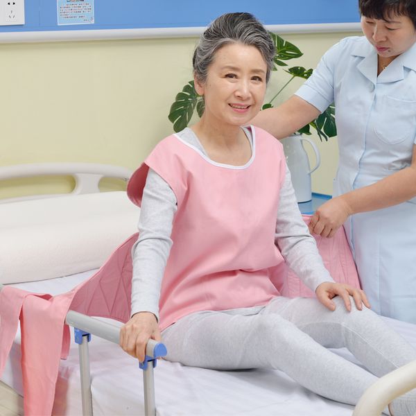 

posey criss cross chest vest restraint for use with bed or chair green/pink safety protective