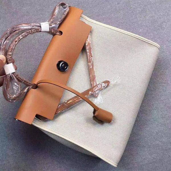 

luxury handbags fall 2021 new women's leather waterproof canvas contrast hand her bag2396