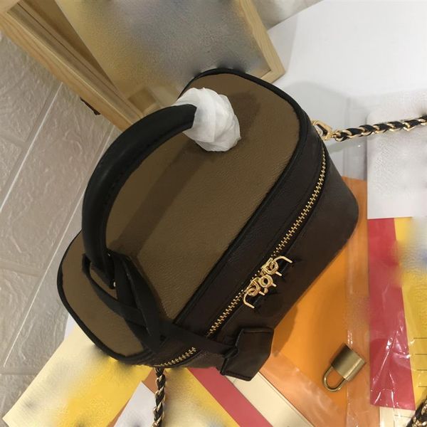 

small handbag cosmetic bag designer canvas whether hand-held or fastened with leather chain straps to achieve over the shoulder or231y