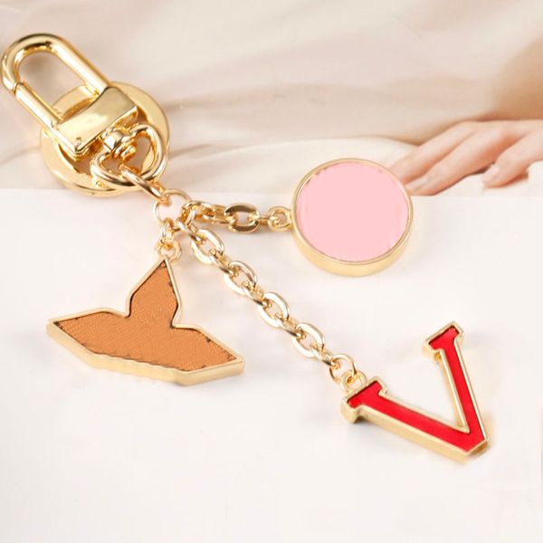 

luxury designer keychain fashion classic brand key buckle letter design handmade gold flower keychains mens womens bag pendant 2304212z, Silver
