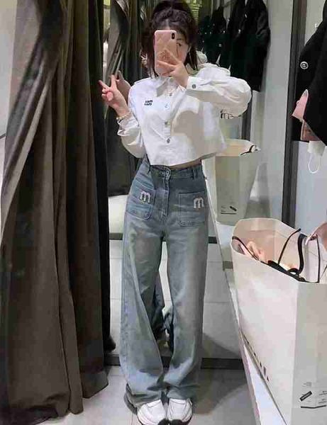 

women's jeans designer 2023 spring/summer new heavy industry studded bead letter decoration denim straight leg trousers washed and worn, Blue