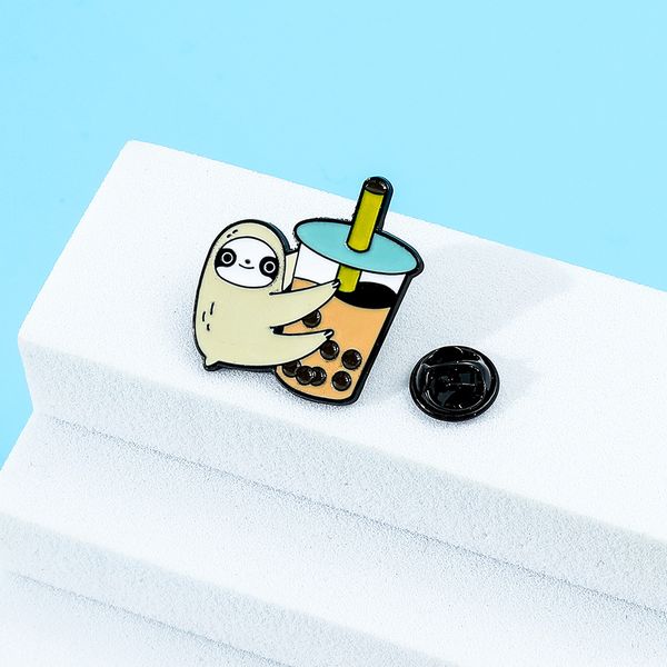 

sloth embracing pearl milk tea pin cute anime movies games hard enamel pins collect metal cartoon brooch backpack hat bag collar lapel badge, Blue