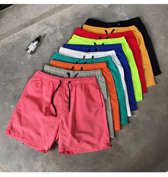 

wholesale summer promotion men polyester solid color quick dry running mesh lining stock casual shorts for, White;black