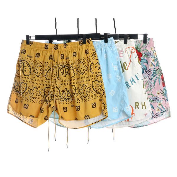 

designer clothing short casual rhude woven nylon double layer shorts cashew flowers all over the body floral casual vacation beach pants loo, White;black