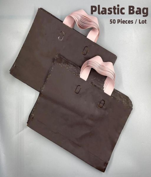 

brand designers women monogrames frosted tote bags plastic bag original men clothing shopping bags new fashion gift b9721750
