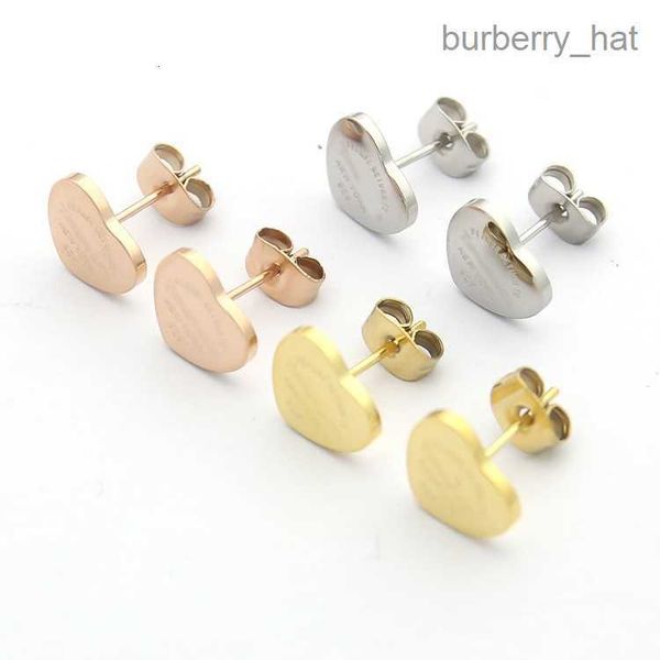 

womens heart-shaped earrings studs designer jewelry simplicity studs color gold /silver /rose full brand as wedding christmas gift, Golden;silver