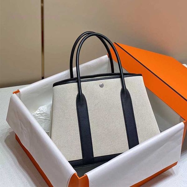 

designer herbag garden party evening classic handmade wax thread tote bucket canvas collage togo cowhide garden party garden bag large 2h7v