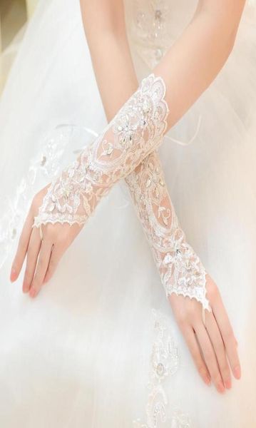 

fashion rhinestone bridal dress long design gloves bandage fingerless ivory lace gloves bridal accessorie wedding gloves ht751317533, White