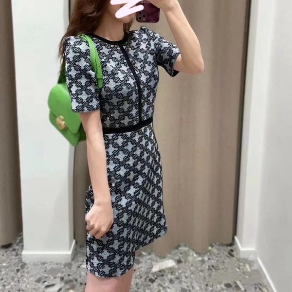 

maje woman's knit dress with metal eyelets, White;black