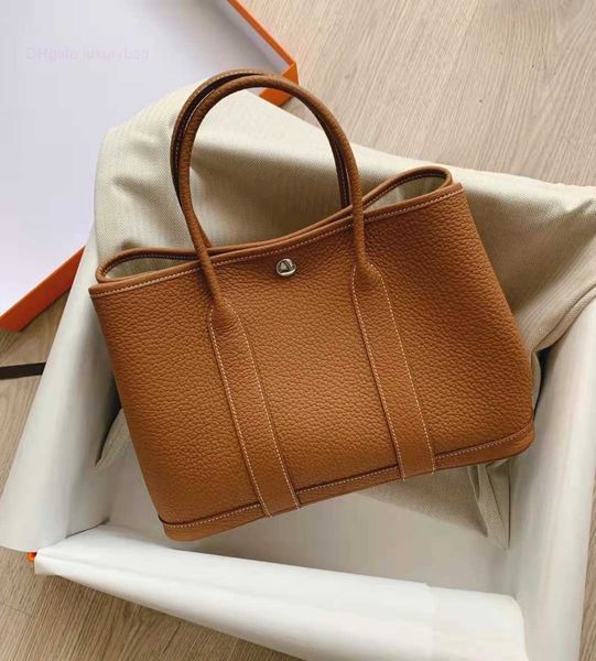 

designer herbag garden party evening new lychee grain cowhide garden large capacity tote real leather female portable bucket bag fugu