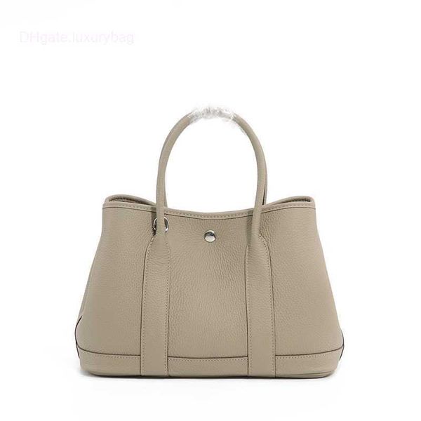 

designer herbag garden party evening autumn and winter shopping lychee grain layer cowhide women's garden leather vegetable basket hand