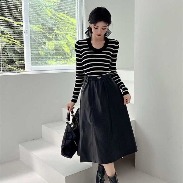 

26% off clothing designer quality family autumn/winter new classic triangle elevated a-line large hem elastic waist versatile leather skirt, Black