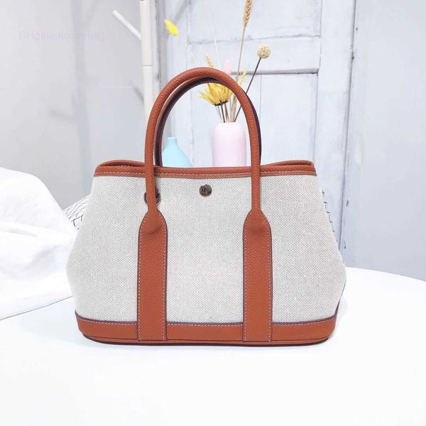 

designer herbag garden party evening 2023 new canvas garden women's one shoulder oblique straddle portable fashion shopping bucket tote