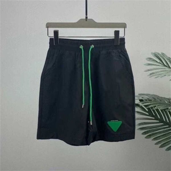 

22% off summer european station fashion triangle sign capris green loose dried beach casual men's and women's shorts, White;black