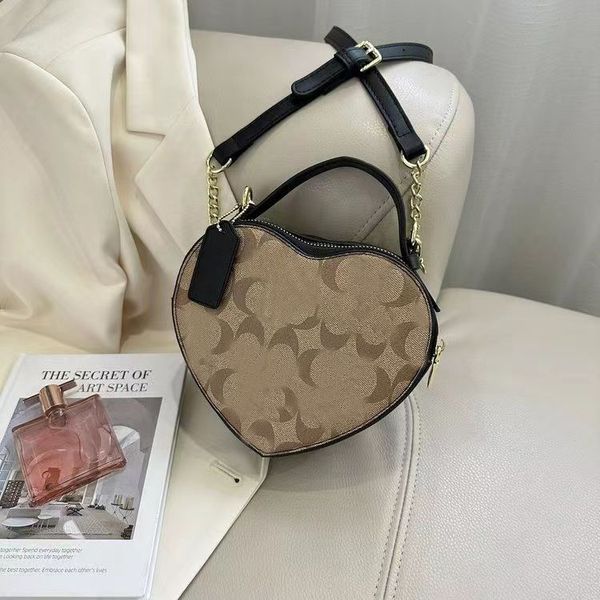 

1:1 quality desinger heart shaped bag mini cute shoulder bag women co handbag vintage cloudy tote leather fashion pink crossbody bag