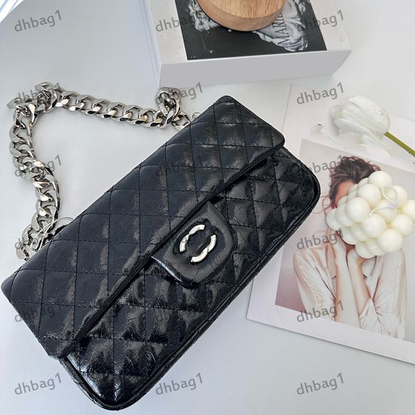 

designer womens shoulder bag leather clamshell spread seam ribbed handbag diagonal span bag silver hardware turn buckle thick chain makeup b