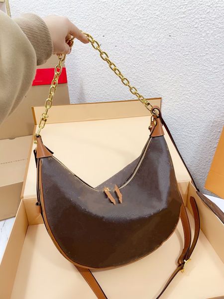 

5a23ss classic designer single shoulder bag with crescent shaped front and back dual color design, gold chain leather shoulder strap, luxury
