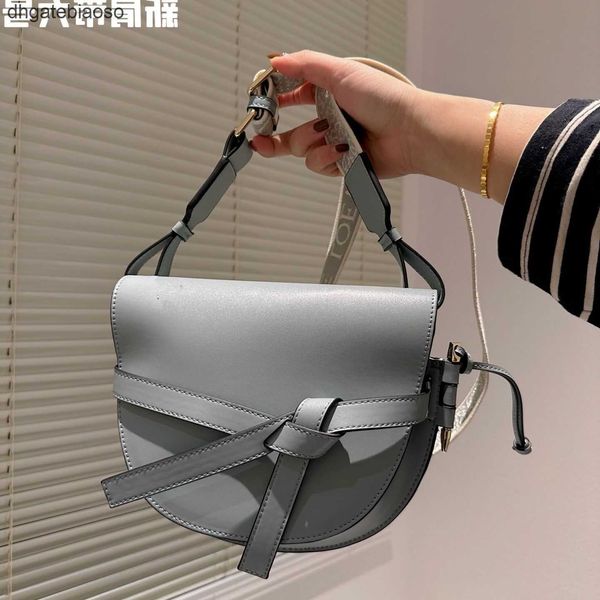 

loews cowhide 2023 single bags gates layer designer saddle bag crossbody bowknot embroidered belt letter knitted shoulder strap 4xhp