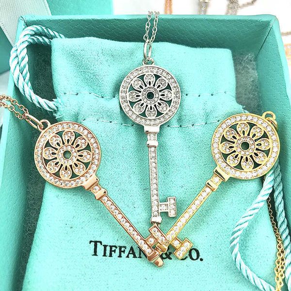 

brand tiffay s925 sterling silver inlaid with diamond sunflower key small crowd high-grade sweater chain women's versatile temperament, Black