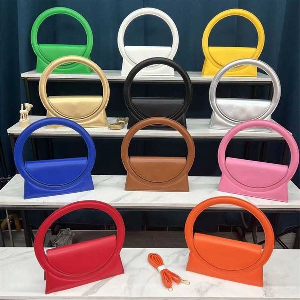 

fashion designer bag women's shoulder handbag large ring handheld clamshell retro wallet lipstick mobile phone plain color small strap