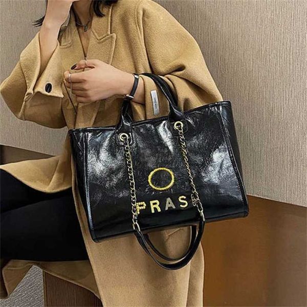 

fashion luxury handbags beach bags brand metal badge tote bag small evening handbag female capacity large leather one shoulder backpack 50%