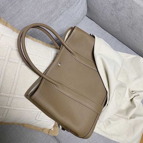 

garden party designer totes bag autumn and winter new layer cowhide bag women's bag leather one-shoulder cross-body portable large-capa