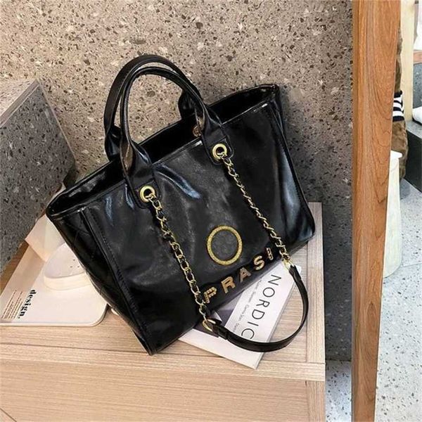

80% official site usa classic luxury handbags beach bags brand metal badge tote bag small evening handbag female capacity large leather one