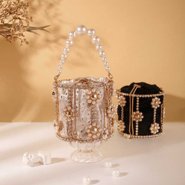 

evening bags handbags for women 2023 designer luxury metal hollow out diamonds bucket party wedding pearl tote 230427