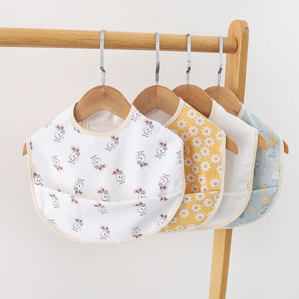 

cute children's bib 360 degrees rotating flower waterproof towel to
