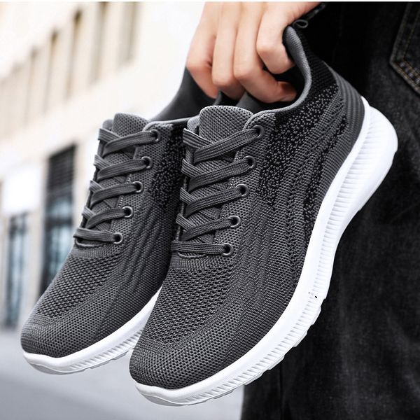 

men's running shoes are lightweight and comfortable.with lightweight shock absorption white black and grey outdoor sports shoes for men