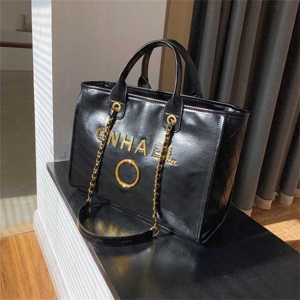 

classic luxury handbags beach bags brand metal badge tote bag small evening handbag female capacity large leather one shoulder backpack pv9a